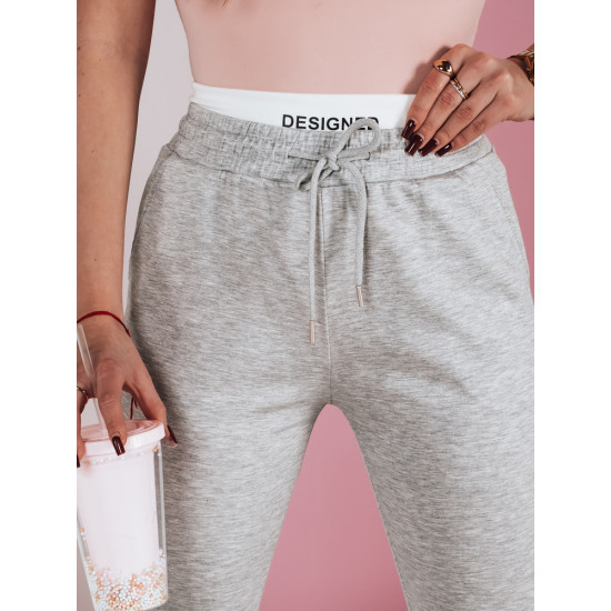 Moteriškos laisvalaikio pilkos slim fit kelnės Sport UY2400 - Džinsai ir Kelnės Moteriškos laisvalaikio pilkos slim fit kelnės Sport UY2400