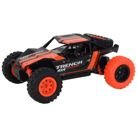 Nuotoliniu būdu valdomas visureigis R/C 1:24 Orange 17178 - Žaislai Nuotoliniu būdu valdomas visureigis R/C 1:24 Orange Radijo bangomis valdomi žaislai