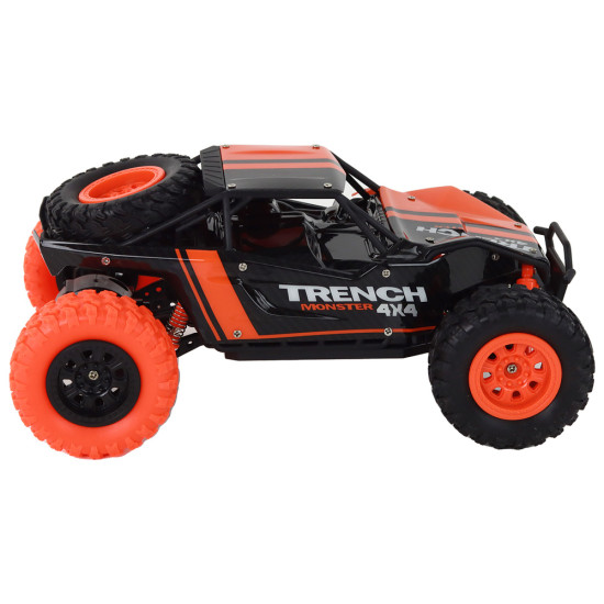 Nuotoliniu būdu valdomas visureigis R/C 1:24 Orange 17178 - Žaislai Nuotoliniu būdu valdomas visureigis R/C 1:24 Orange Radijo bangomis valdomi žaislai