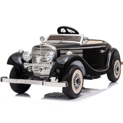 Juodas elektrinis automobilis Mercedes 540K
