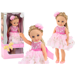 Lėlė su rožine suknele ir plaukų segtuku, 38 cm Lėlė su rožine suknele ir plaukų segtuku, 38 cm