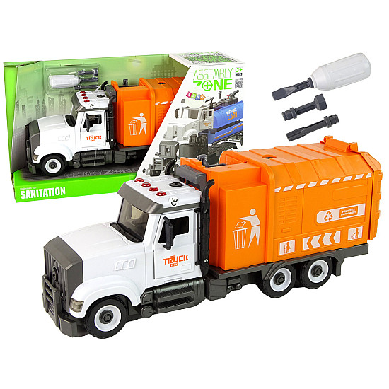 Oranž prügikasti veoauto