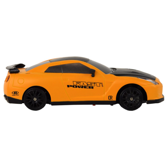 Nuotoliniu būdu valdomas sportinis automobilis R/C 1:24 geltonos spalvos keičiamais ratais Radijo bangomis valdomi žaislai