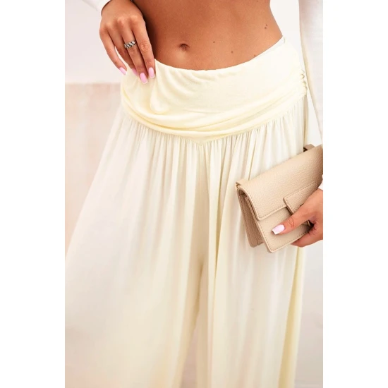 Moteriškos švisiai geltonos kelnės su klostėmis Prosa Džinsai ir Kelnės