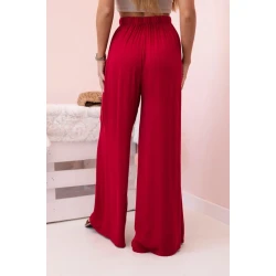 Moteriškos plačios tamsiai raudinos spalvos kelnės Andi 