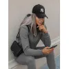 Moteriškas tamsiai pilkas  sportinis kostiumas Super 18