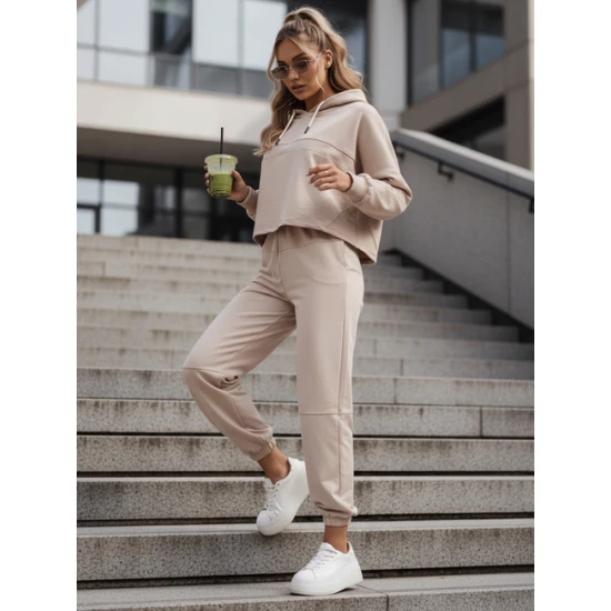Moteriškas rusvas sportinis kostiumas Bistan Moteriški komplektai