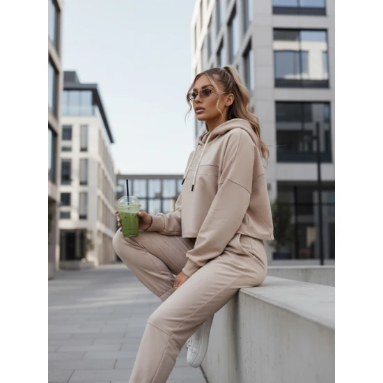 Moteriškas rusvas sportinis kostiumas Bistan Moteriški komplektai