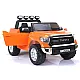 Oranssi Toyota Tundra katumaasturi