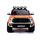 Oranssi Toyota Tundra katumaasturi