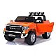 Oranssi Toyota Tundra katumaasturi