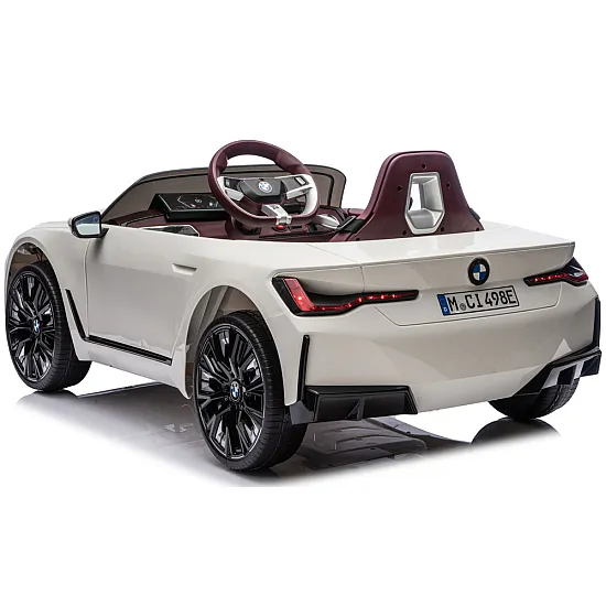 Valge akutoitega auto BMW i4 4x4 JE1009 Autod