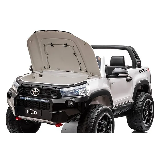 Baltas elektrinis vaikiškas automobilis Toyota Hilux