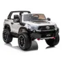 Белый детский электромобиль Toyota Hilux