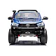 Sininen sähkökäyttöinen lastenauto Toyota Hilux