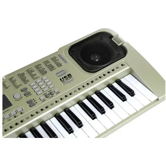 Pilkas muzikinis pianinas su mikrofonu Muzikos instrumentai
