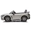 Pilkas elektrinis automobilis Mercedes AMG DK-GT63