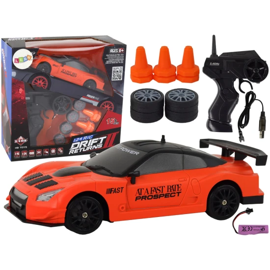 Nuotoliniu būdu valdomas sportinis automobilis R/C 1:24 oranžinės spalvos keičiamais ratais Radijo bangomis valdomi žaislai
