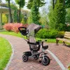 2-in-1 rusvas triratis vežimėlis su pasukama sėdyne