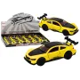 Игрушечный жёлтый спортивный автомобиль